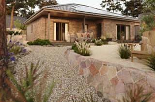 Haus kaufen in 31812 Bad Pyrmont, Modern & solide: Verklinkerter Winkelbungalow für Anspruchsvolle