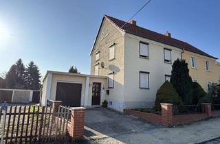Doppelhaushälfte kaufen in 02708 Löbau, Doppelhaushälfte mit Garage in ruhiger Lage von Löbau