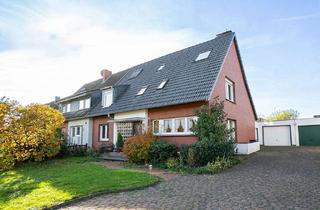 Haus kaufen in Platanenweg, 46569 Hünxe, Charmantes Zweifamilienhaus in beliebter Wohnlage von Hünxe-Bruckhausen