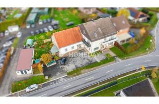 Anlageobjekt in 32139 Spenge, Ertragsstarkes Mehrfamilienhaus mit ca. 6 % Rendite, Garagen & Entwicklungspotenzial