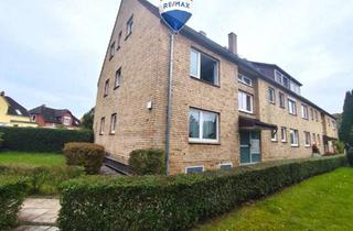 Wohnung kaufen in 23611 Bad Schwartau, Attraktive 4-Zimmer-Maisonettewohnung mit Balkon und 2 Garagen in ruhiger Lage