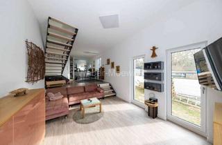 Wohnung kaufen in 50181 Bedburg, Haus-im-Haus-Charakter: hochwertige Maisonettewohnung mit Terrasse + Loggia