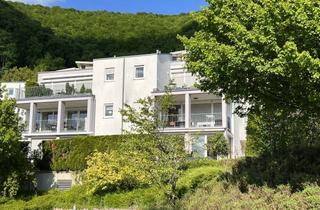 Wohnung kaufen in 72574 Bad Urach, Eigentumswohnung mit 2,5 Zimmer, großer Terrasse, TG-Stellplatz und Blick auf die schwäbische Alb