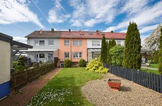 Reihenhaus kaufen in 38368 Querenhorst, Haus statt Wohnung -Gemütliches Reihenhaus mit Garten und drei Garagen