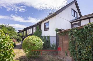 Einfamilienhaus kaufen in 35096 Weimar, Geräumiges Einfamilienhaus mit ausgebautem Dachgeschoss und Einliegerwohnung, sofort frei.