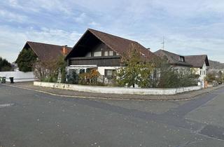 Einfamilienhaus kaufen in 35418 Buseck, Einfamilienhaus mit Einliegerwohnung in begehrter Wohnlage von Großen Buseck