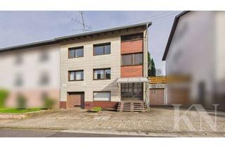 Haus kaufen in 66346 Püttlingen, Vielseitiges Zweifamilienhaus mit großem Potenzial in zentraler Lage von Püttlingen!