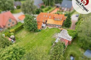 Haus kaufen in 26553 Dornum, Nordsee-Nähe inklusive: Charmantes Zweifamilienhaus mit Ferienwohnung und großem Garten