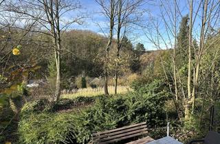 Grundstück zu kaufen in 42579 Heiligenhaus, Traumhaftes Grundstück in Hanglage mit einem sanierungsbedürftigen Zweifamilienhaus!