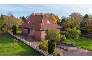 Haus kaufen in 26624 Südbrookmerland, Modernisierter Bungalow auf großzügigem Grundstück in ländlicher Lage