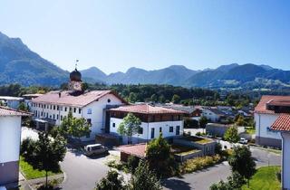 Wohnung kaufen in 83098 Brannenburg, Modernes Familienglück - 4,5 Zi. Souterrainwhg. mit Garten und Bergblick im Inntal