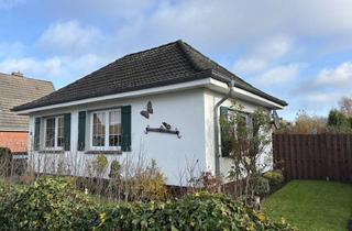 Haus kaufen in 26524 Hage, Ebenerdiger Winkelbungalow in zentraler Lage