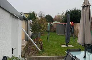 Doppelhaushälfte kaufen in 64521 Groß-Gerau, Groß-Gerau - Sanierte Doppelhaushälfte mit Garage und schönem Garten