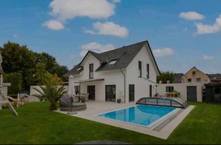 Einfamilienhaus kaufen in 47495 Rheinberg, Rheinberg - Einfamilienhaus mit überdachtem Salzwasserpool in Rheinberg Wesel