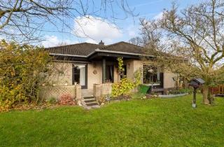Haus kaufen in 27801 Dötlingen, Dötlingen - Bungalow mit wohnlich nutzbarem Keller und Doppelgarage