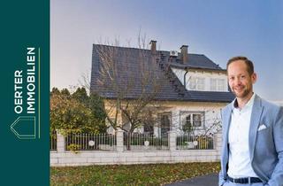 Haus kaufen in 91325 Adelsdorf, Exklusives Zweifamilienhaus mit Einliegerwohnung, Garten, Pool und Platz für Ihre Visionen!