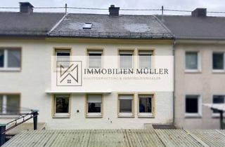 Haus kaufen in 54584 Jünkerath, Zweifamilienreihenmittelhaus mit Ausbaupotenzial