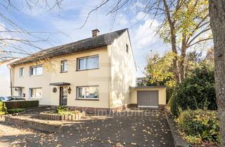 Doppelhaushälfte kaufen in 50321 Brühl, Gemütliche Doppelhaushälfte mit Keller, Garten, Garage, Potenzial und Reserven.