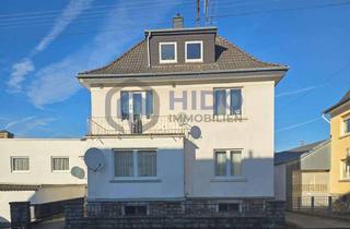 Mehrfamilienhaus kaufen in 56235 Ransbach-Baumbach, Reserviert - Modernisiertes Mehrfamilienhaus in Ransbach-Baumbach – 4 Wohnungen, 3 Garagen