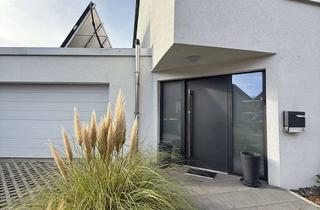 Einfamilienhaus kaufen in 44625 Holsterhausen, Hidden Champion! Stylisches Einfamilienhaus mit Doppelgarage und zwei vermieteten Wohneinheiten