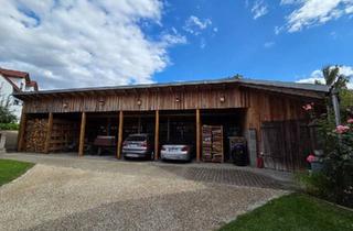 Haus kaufen in 96138 Burgebrach, Burgebrach - Saniertes Anwesen mit vier getrennten Wohnungen