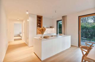 Wohnung kaufen in 15741 Bestensee, Wohnen am See – Stilvolle Gartenwohnung mit moderner Architektur