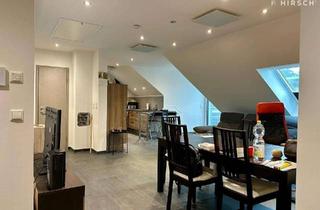 Wohnung kaufen in 90453 Reichelsdorf, Traumhafte Dachgeschosswohnung: Modern und energieeffizient!