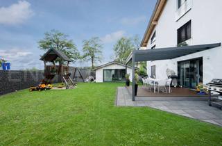 Haus kaufen in 85640 Putzbrunn, Flexibles Wohnkonzept: 3 Wohneinheiten & Atelier - Wohnen, Arbeiten, Vermieten