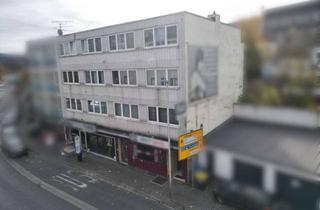 Mehrfamilienhaus kaufen in 66333 Völklingen, Attraktives Mehrfamilienhaus mit 6 Wohneinheiten und 2 Gewerbeeinheiten - ca. 7 % Rendite