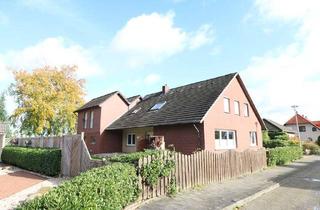 Haus kaufen in 49685 Emstek, Geräumiges, modernisiertes Zweifamilienhaus mit Keller und Garagen