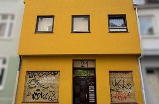 Haus kaufen in 23552 Innenstadt, Altstadthaus mit kleinem Innenhof und lukrativer Zimmervermietung