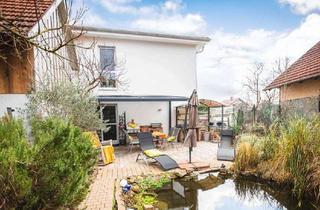 Einfamilienhaus kaufen in 76461 Muggensturm, Nachhaltiges Einfamilienhaus mit Gartenidylle & Doppelgarage – Effizienzhaus KfW55 in Muggensturm