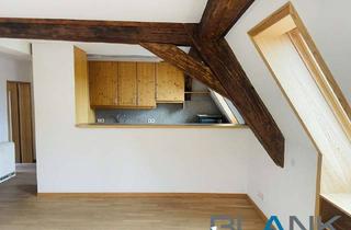 Wohnung kaufen in 71229 Leonberg, Großzügige 4–5-Zimmer-Dachgeschosswohnung mit Bühne – Altbaucharme am Marktplatz Leonberg