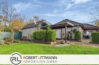 Einfamilienhaus kaufen in 28832 Achim, Charmantes Haus mit Kamin und idyllischem Garten – mitten in Achim