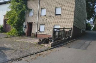 Einfamilienhaus kaufen in 54689 Dahnen, Dahnen - Investitionsobjekt in Olmscheid - ca. 150m² WF, Garage