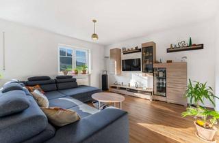 Wohnung kaufen in 94209 Regen, Charmante Maisonette-Eigentumswohnung mit Gartenanteil und Kachelofen!