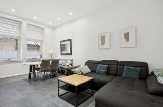 Wohnung kaufen in 41238 Mülfort, Altbaucharme trifft Wohnkomfort: Gemütliche Maisonette-Erdgeschosswohnung mit Terrasse in Mülfort