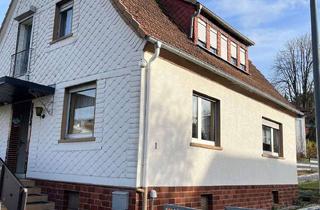 Einfamilienhaus kaufen in 35792 Löhnberg, Solides Einfamilienhaus mit Garten in ruhiger Lage