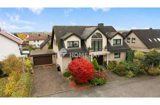 Einfamilienhaus kaufen in 32130 Enger, Familienfreundliches Einfamilienhaus mit großem Garten, Kamin und Doppelgarage