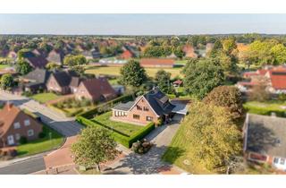 Einfamilienhaus kaufen in 26556 Westerholt, Vielfältig nutzbares Einfamilienhaus mit zusätzlichem Baugrundstück in zentraler Lage von Westerholt