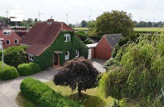 Haus kaufen in 26831 Bunde, Fernblick im Garten, Gemütlichkeit im Haus
