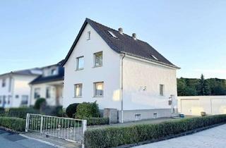 Doppelhaushälfte kaufen in 44359 Mengede, GEPFLEGTE DOPPELHAUSHÄLFTE MIT GARAGEN AUF GROßEM GRUNDSTÜCK IN DER MENGEDER HEIDE