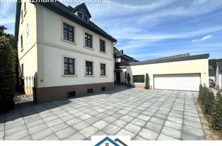 Haus kaufen in 53947 Nettersheim, 2 Häuser: Repräsentatives Wohnhaus, Ferienwohnung, Arztpraxis u. Doppelgarage (ca. 571 m² WFL/NFL) z