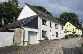 Haus kaufen in 59602 Rüthen, Interessante Kapitalanlage in zentraler Lage von Rüthen! Vermietetes und renovierte Dreifamilienhaus