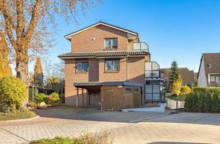Wohnung kaufen in 25451 Quickborn, Großzügiges Wohngefühl: moderne 2-Zimmer-Wohnung mit Südbalkon & Carport