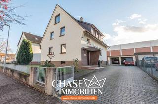 Haus kaufen in 31860 Emmerthal, Attraktives Ein-/Zweifamilienhaus mit vier Garagen - Bestes Familienleben in Emmerthal-Kirchohsen!