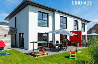 Doppelhaushälfte kaufen in 41379 Brüggen, Exklusive LUXHAUS-Doppelhaushälfte mit klarer Architektur und großzügigem Wohnambiente