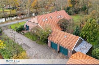 Einfamilienhaus kaufen in 26676 Barßel, Freistehendes Einfamilienhaus mit viel Platz und einer Einliegerwohnung direkt am Kanal. OBJ. 9149