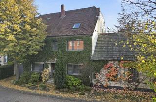 Haus kaufen in 33189 Schlangen, Handwerkertraum in Schlangen – Zweifamilienhaus mit großem Grundstück in zentraler Lage