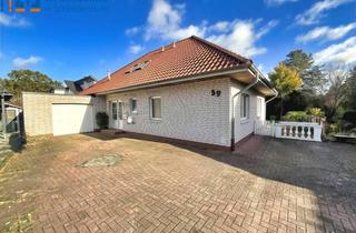 Einfamilienhaus kaufen in 26683 Saterland, Willkommen in Strücklingen: Charmantes Wohnhaus mit Einliegerwohnung und Garage!